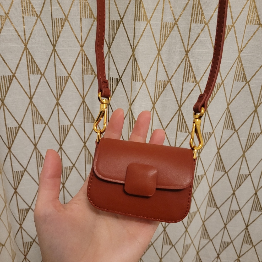 New with box and dust bag Charles & Keith Micro Koa Micropurse in Color Brick